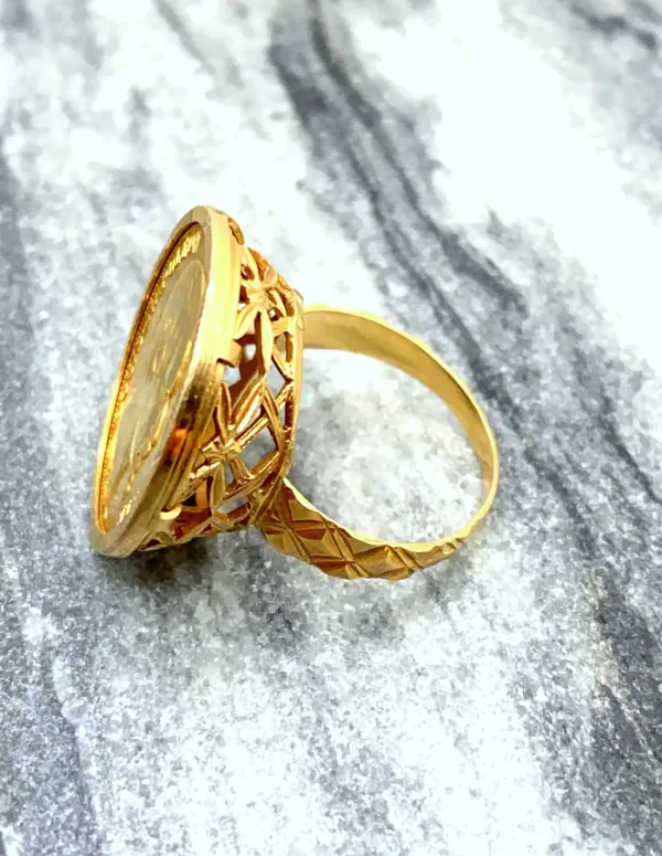 Bague ancienne en or jaune avec pièce 20 francs