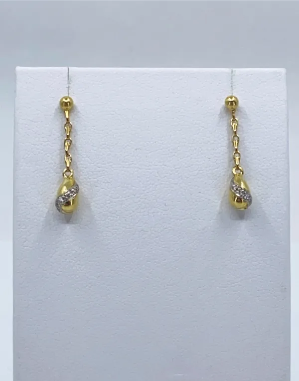 Pendants d'oreilles Cartier en diamants, or jaune et blanc
