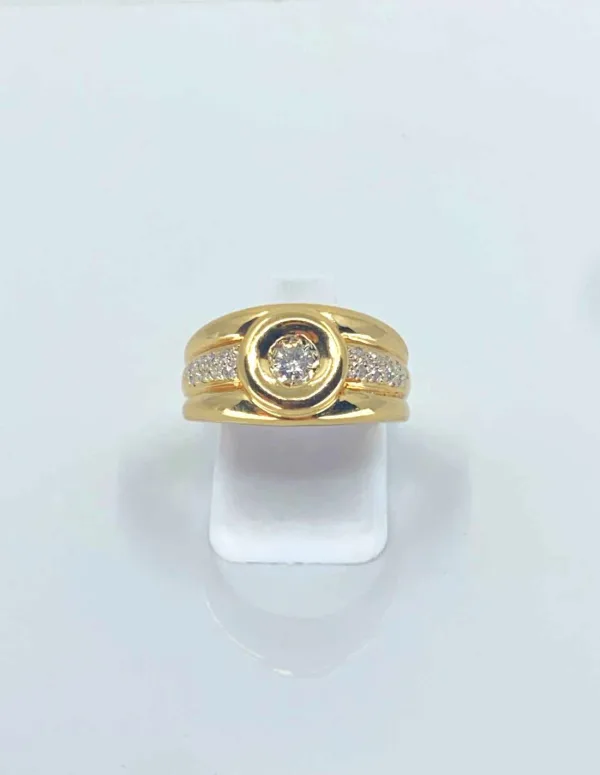 Bague en or jaune (18 carats) et diamants