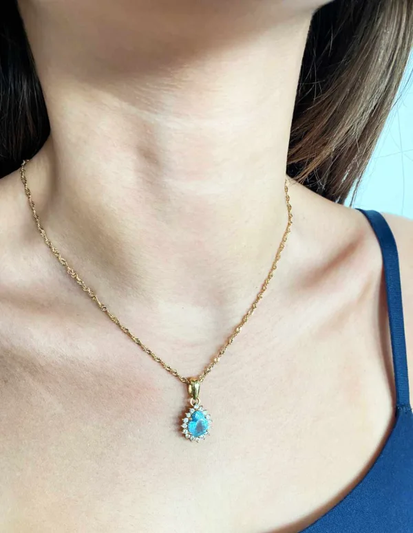 Chaîne en or jaune et pendentif goutte en topaze