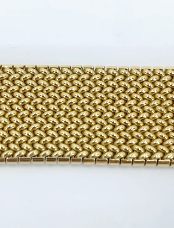 Bracelet manchette vintage signée Caplain en or jaune