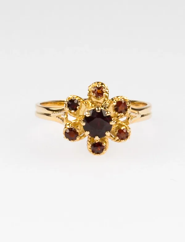Bague Marguerite en or jaune et grenats