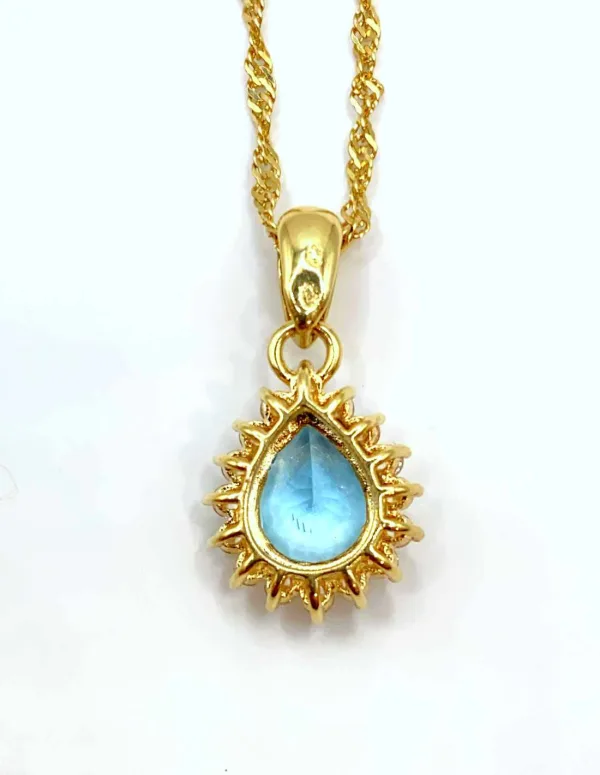 Chaîne en or jaune et pendentif goutte en topaze