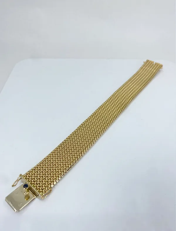 Bracelet manchette vintage signée Caplain en or jaune