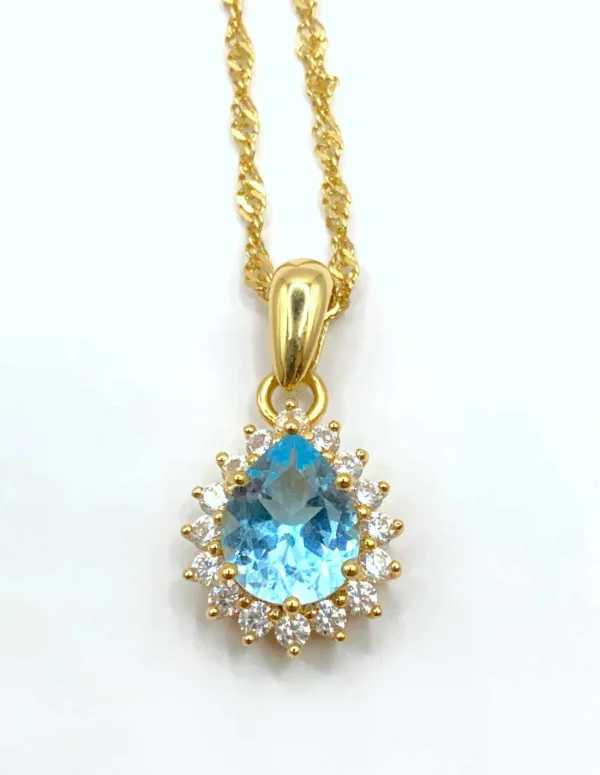 Chaîne en or jaune et pendentif goutte en topaze
