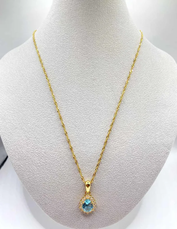 Chaîne en or jaune et pendentif goutte en topaze