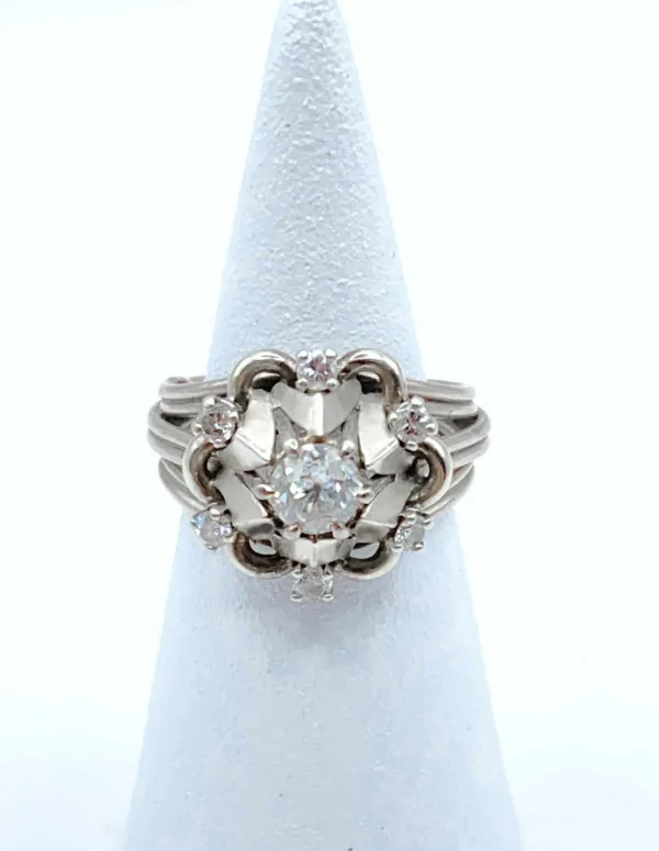 Bague vintage or gris, platine et diamants
