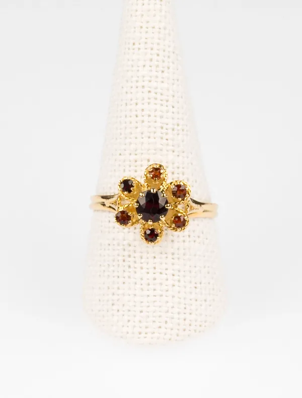 Bague Marguerite en or jaune et grenats