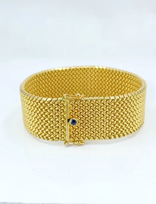 Bracelet manchette vintage signée Caplain en or jaune