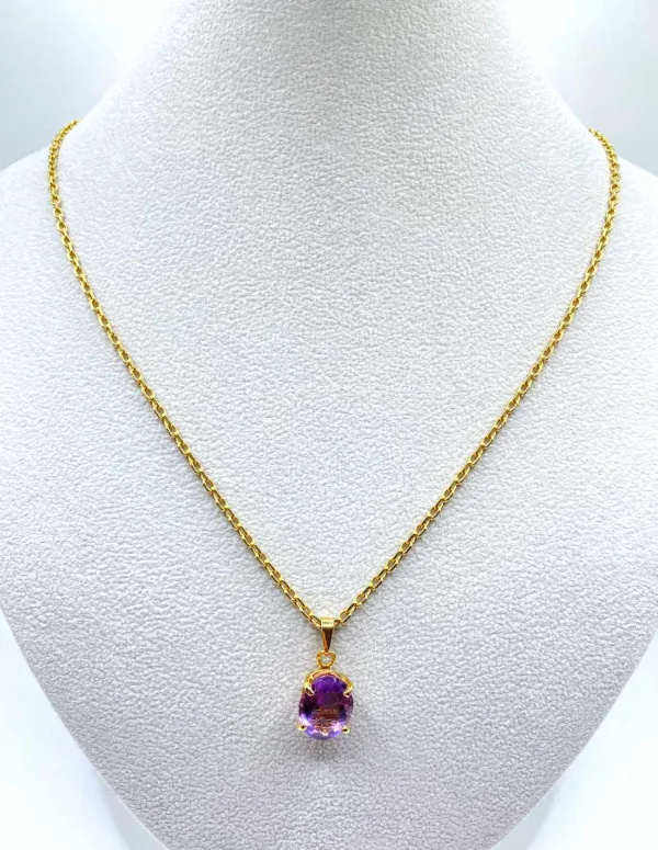 Chaîne en or jaune et pendentif en améthyste